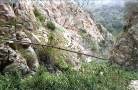 Rubio Canyon water pipes damaged in Northridge earthquake prompting federal aid and subsequent damage due to misplace debris